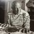 Reprodukcja fotografii „Les pains de Picasso” autorstwa Roberta Doisneau 1994 r.
